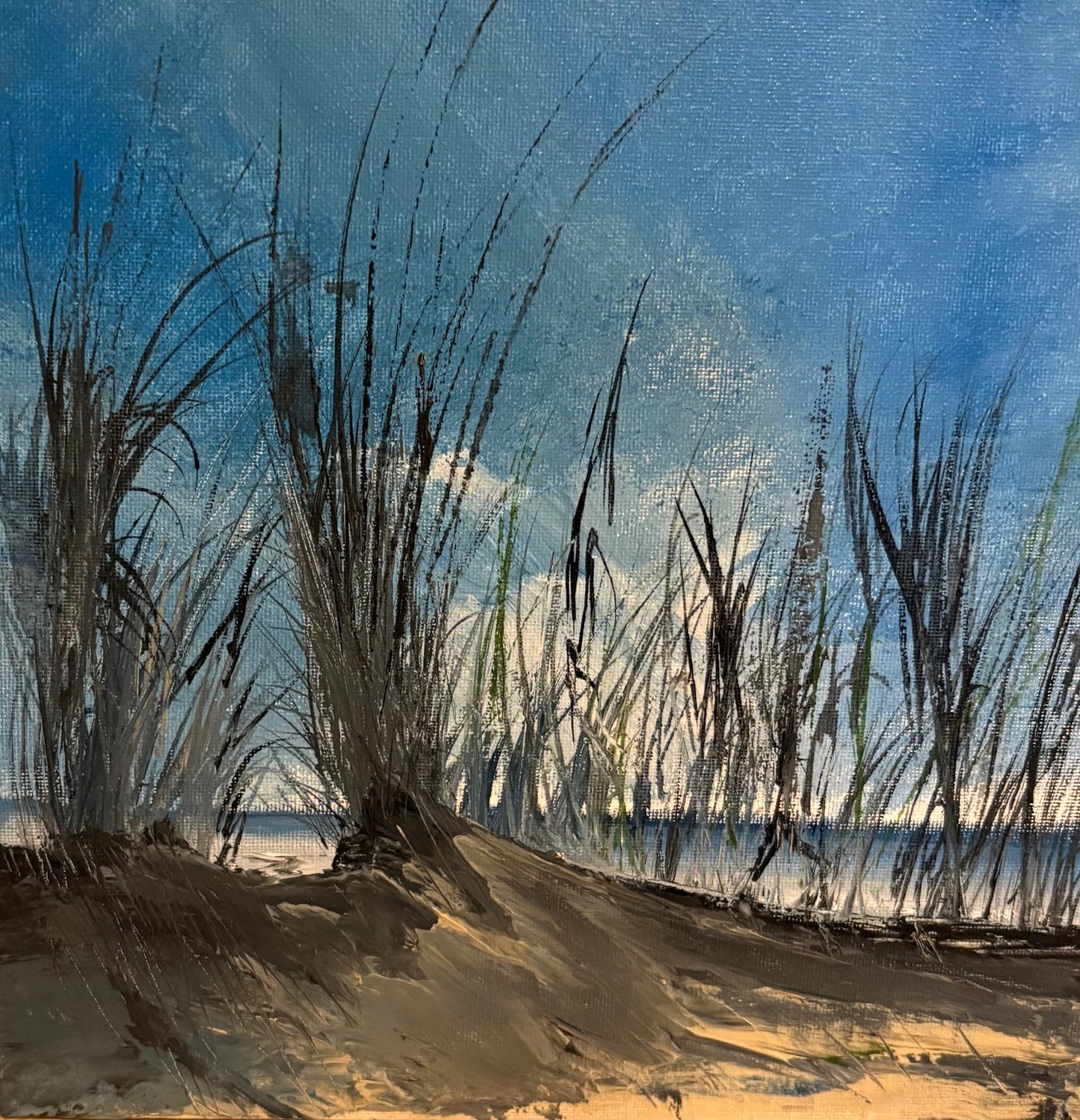 Artistic depiction of beach scene with sand, grass, and water under a blue sky. Dollymount beach painting