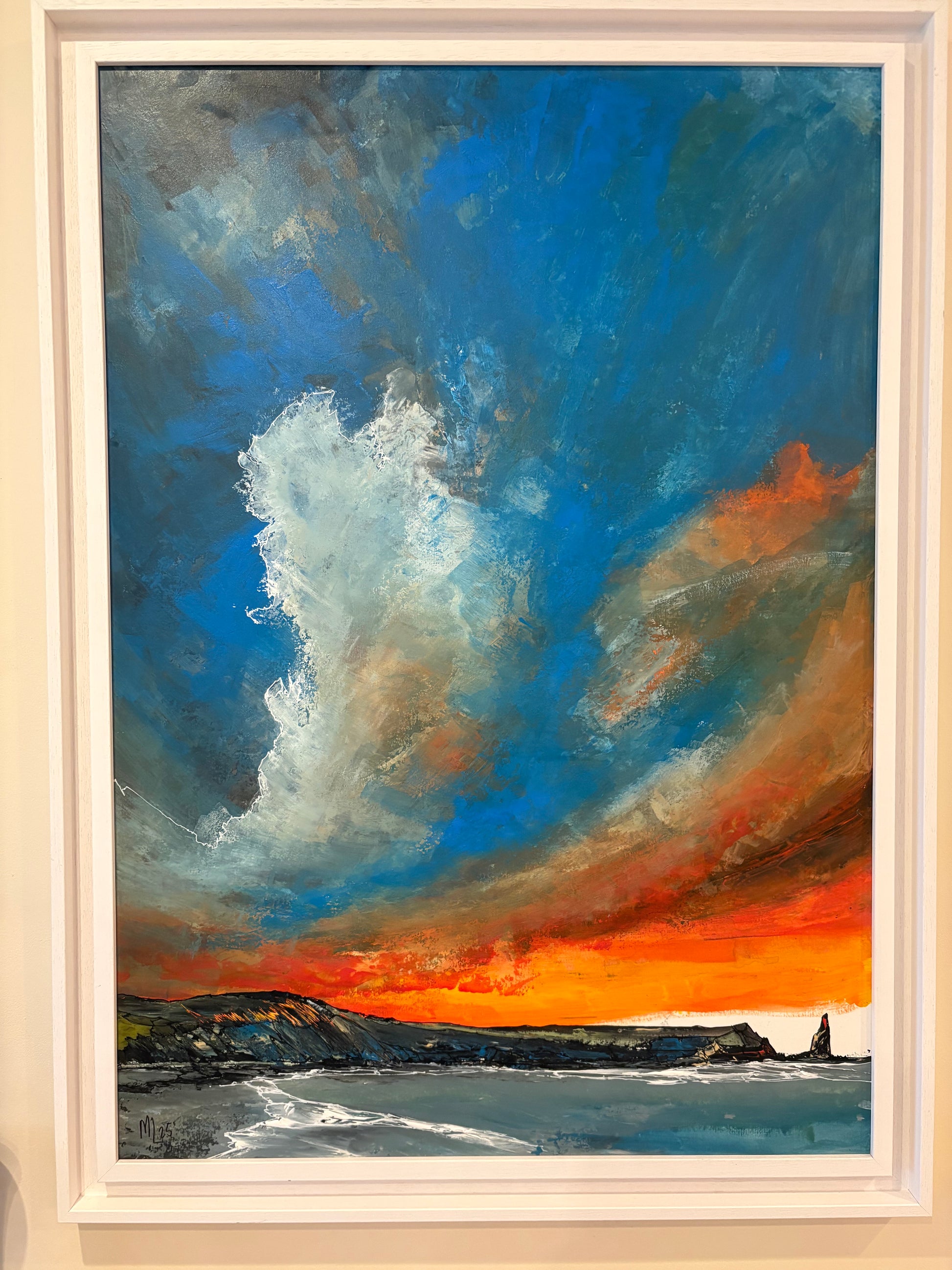 Irish Landscape coastal scene with swirling Sky of blue, orange, and white.