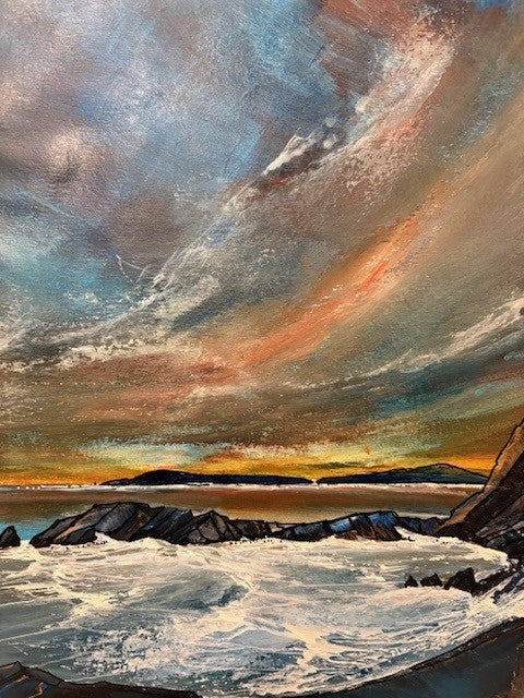 Painting of a Irish coastal scene with rocky shore and dramatic sky.
